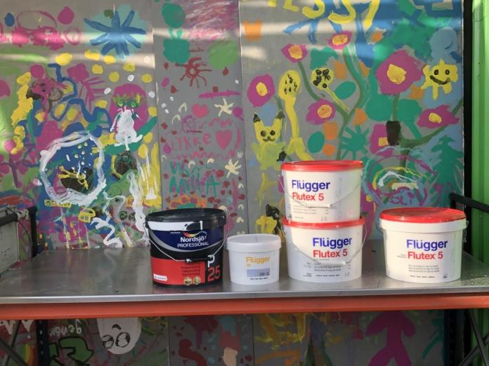 colourful wall paint buckets