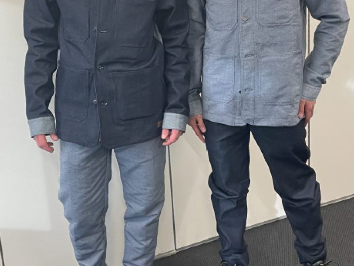 two people wearing recycled clothes